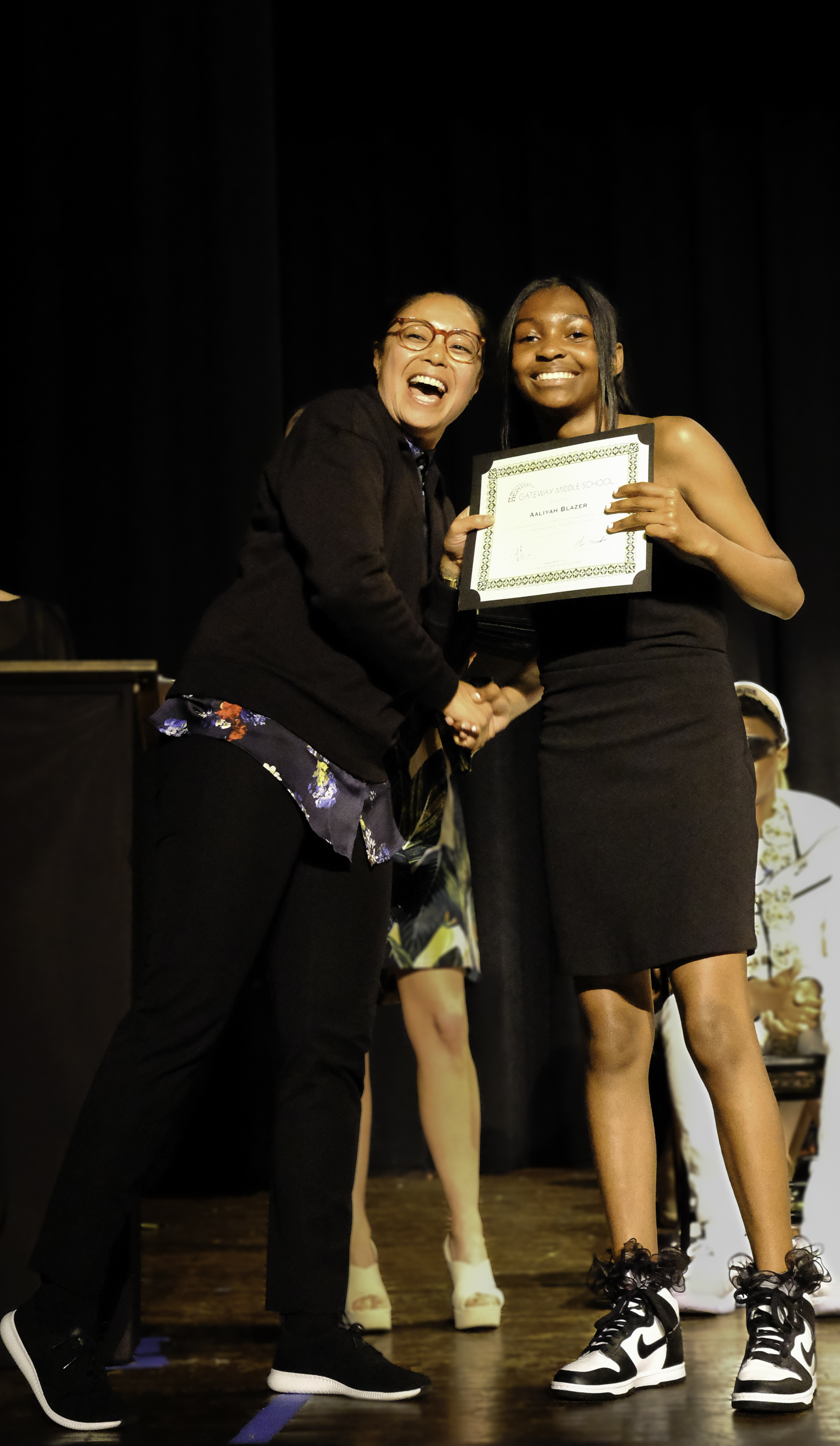 Principal Jai with graduating student