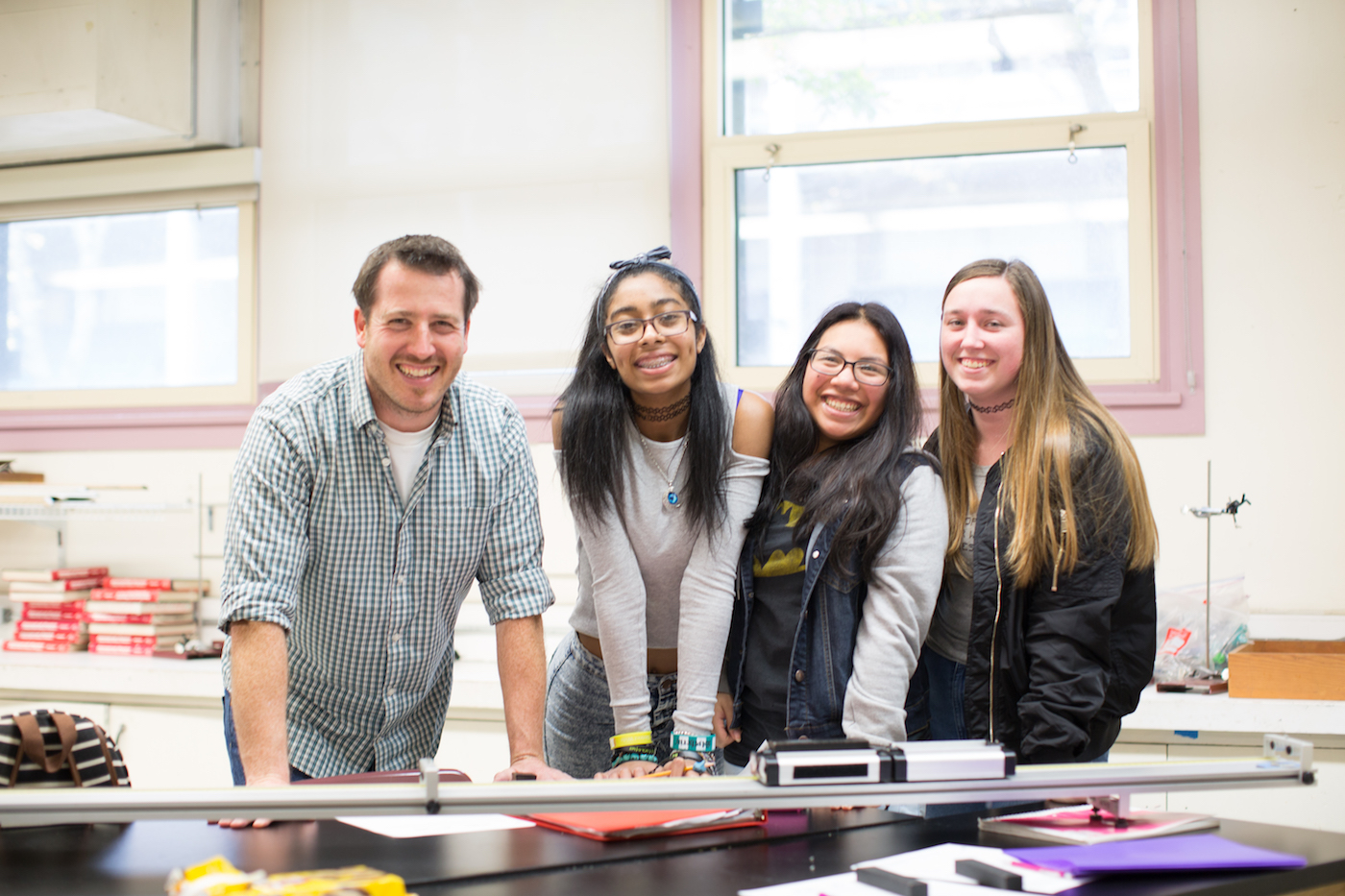 Students working with teacher