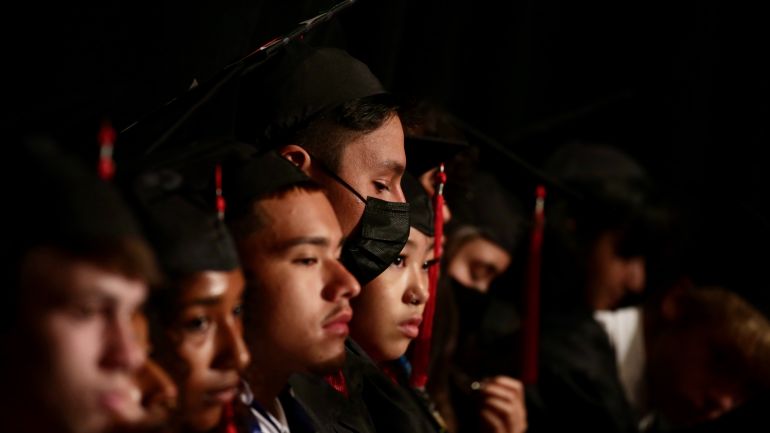 graduates on stage