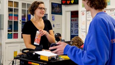 student and teacher talk