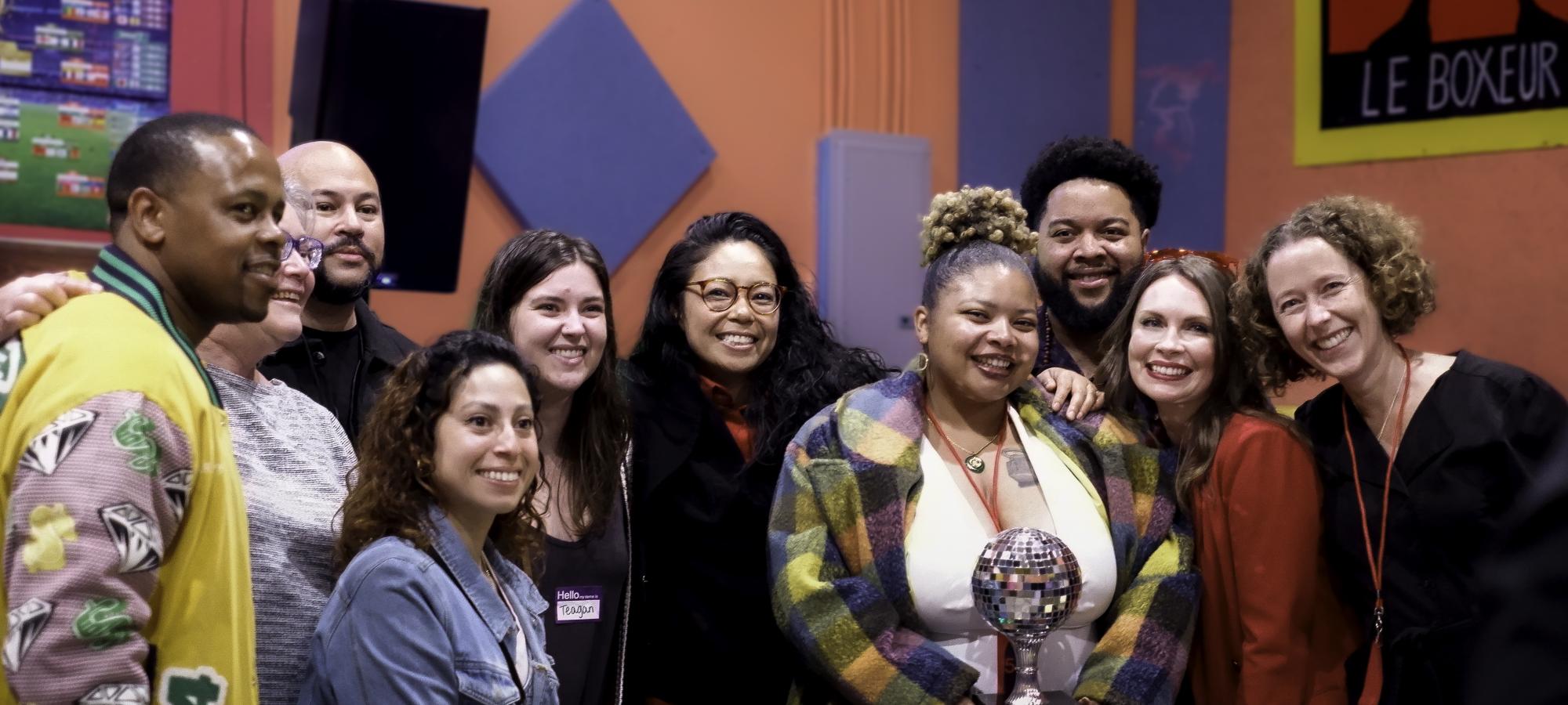 Middle School Teachers pose after winning award