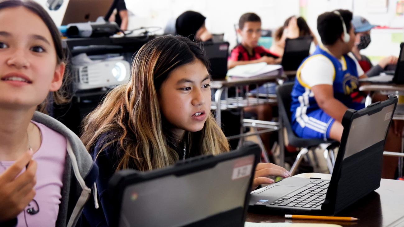 female student using a laptop