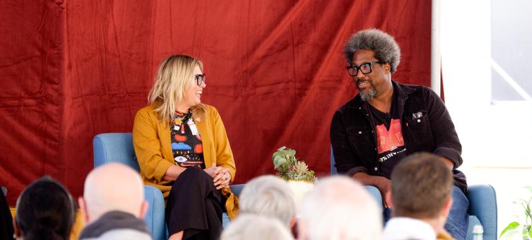 W. Kamau Bell and Kate Schatz on stage