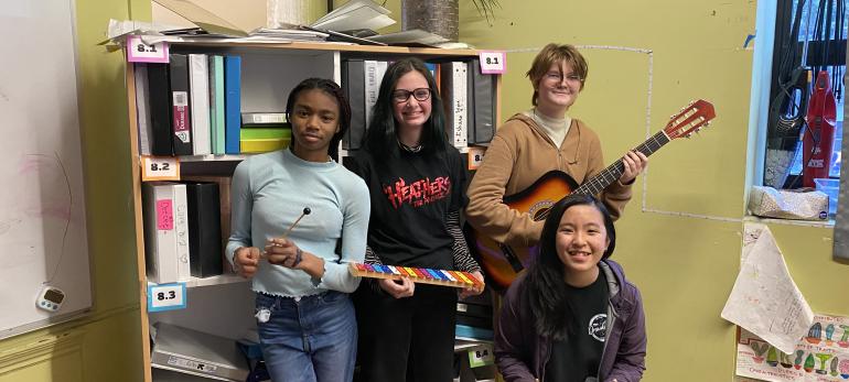 Club members pose with instruments